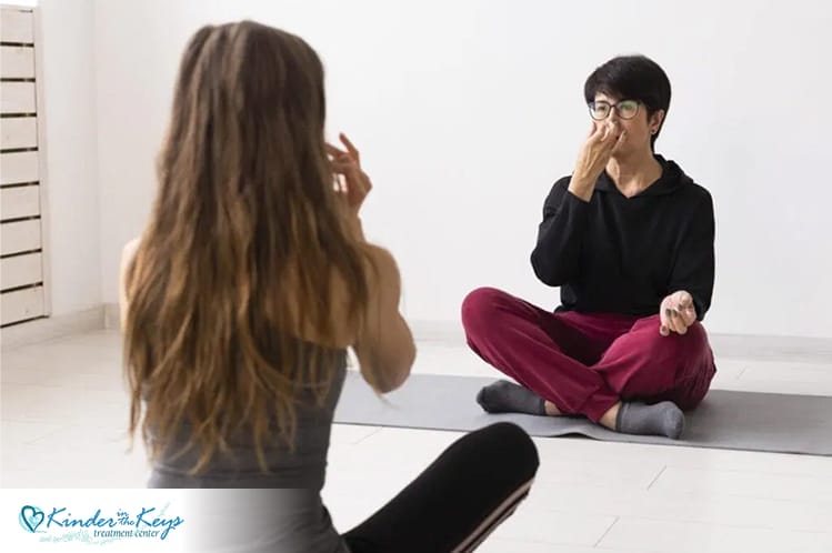 Woman practicing breathing exercises in yoga, holistic healing for depression.